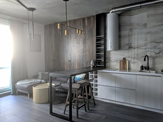 Connecting with the dining area there is open kitchen and lounge areas. Here you can have a quick snack or prepare a meal while talking with your kids or guests chilling on the sofa.