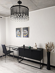 Secondary bedroom is very graphic — plain black and white, yet with elements of Asian style and brigher spots.